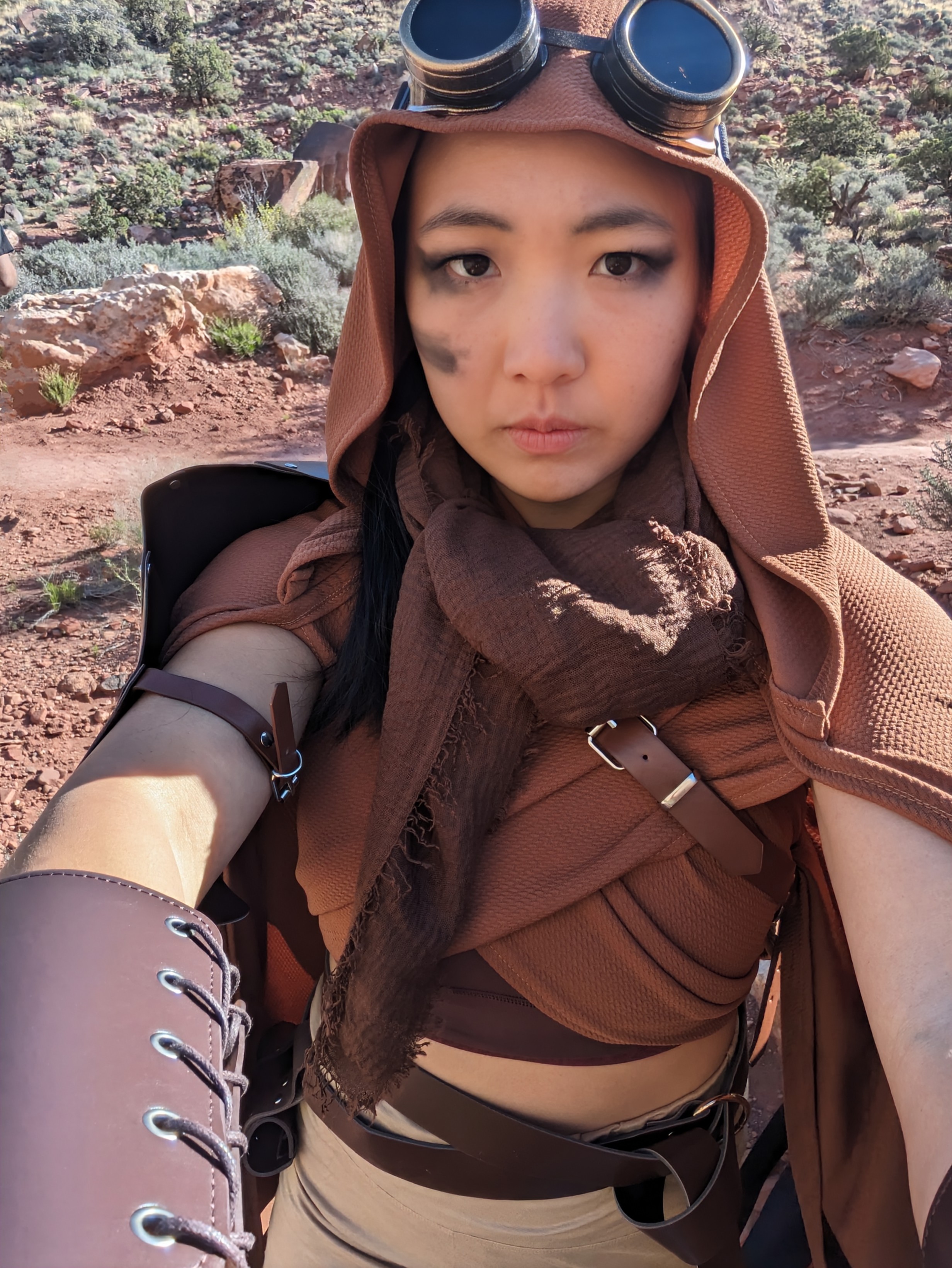 Desert-scavenger costume and makeup for a themed live show